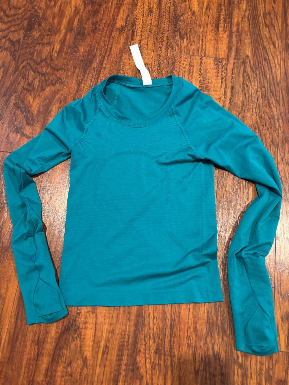 Size 2 Lululemon teal long sleeve swiftly tech